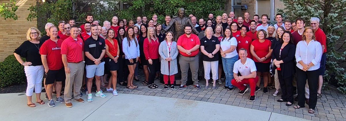 La Salle staff members in courtyard